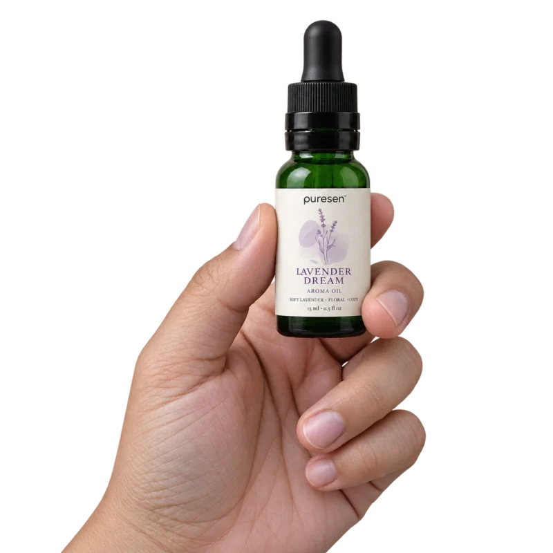 Puresen Lavender Dream 15 ml Aroma Oil held naturally between the fingers of an adult hand
